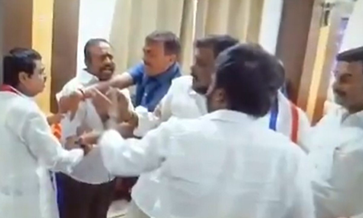 bjp and bc leaders clash over photos in hyderabad