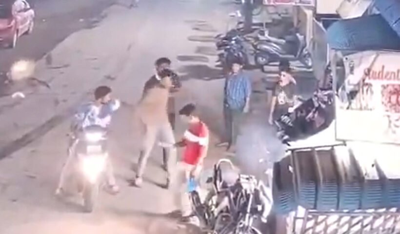 students attacked person who helped them up