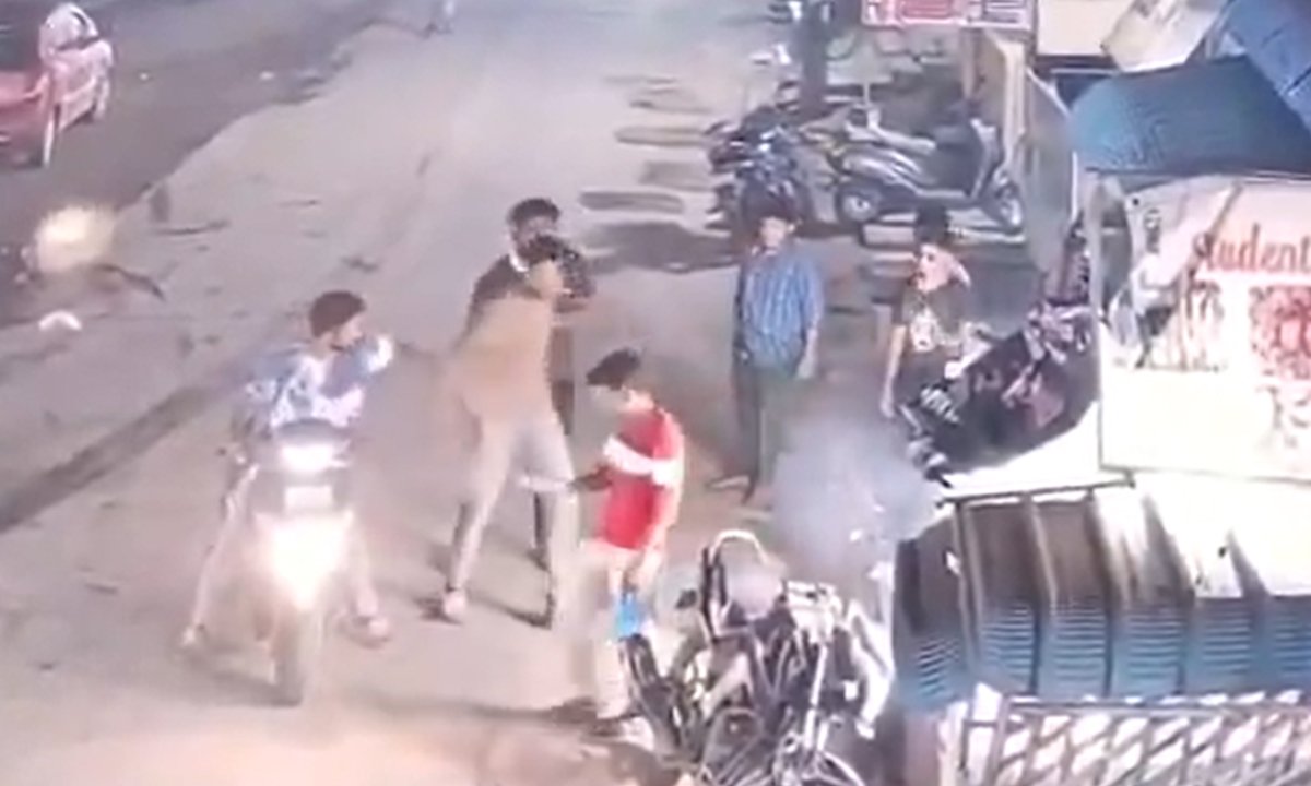 students attacked person who helped them up